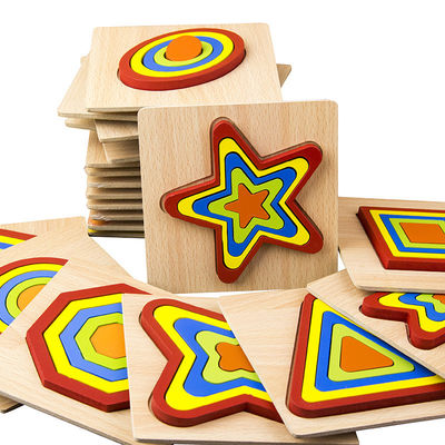 Le puzzle en bois géométrique de bloc de DIY 1cm joue le bébé denteux