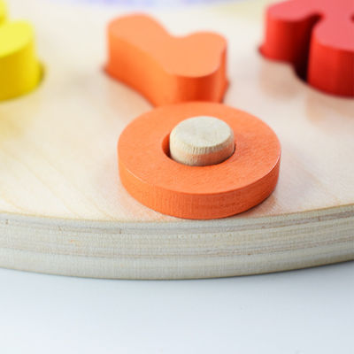 Le puzzle en bois d'horloge de la géométrie numérote Montessori comptant le jouet