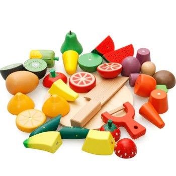 Le légume en bois coloré de la simulation ISO9001 joue le fruit en bois de jeu