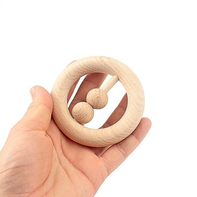 La clochette 6 avancent le bois petit à petit de hêtre sûr en bois de Teethers Tambor Teether