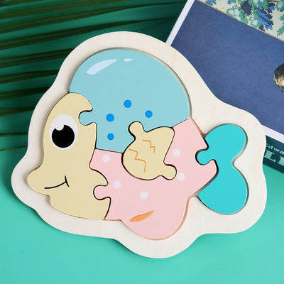 Le puzzle en bois de bloc de Macaron 3D joue les blocs animaux en bois