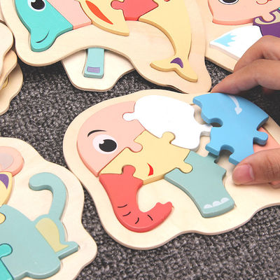 Le puzzle en bois de bloc de Macaron 3D joue les blocs animaux en bois
