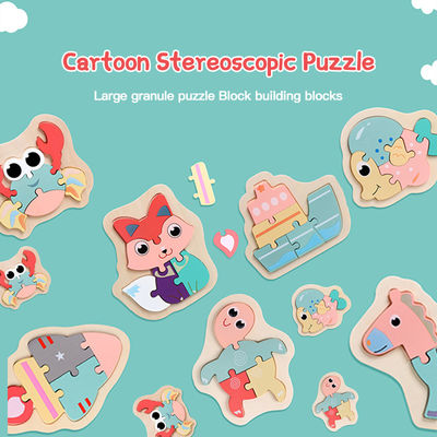 Le puzzle en bois de bloc de Macaron 3D joue les blocs animaux en bois
