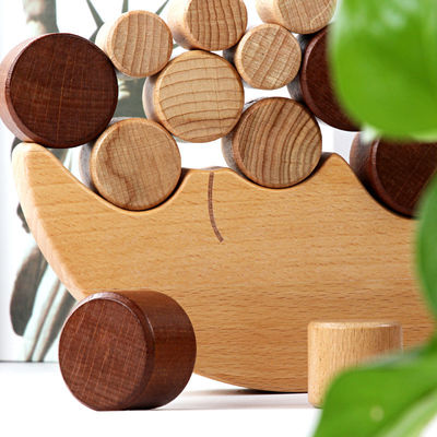 Blocs constitutifs d'équilibre en bois de lune de Montessori des enfants