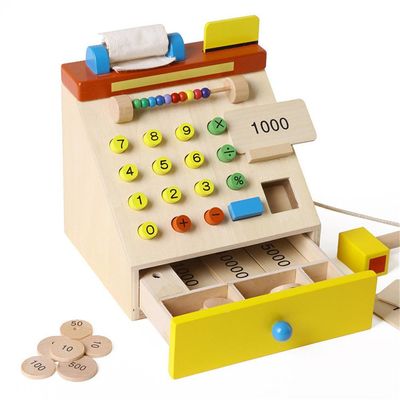 La caisse enregistreuse en bois de simulation d'enfants feignent des jouets de jeu