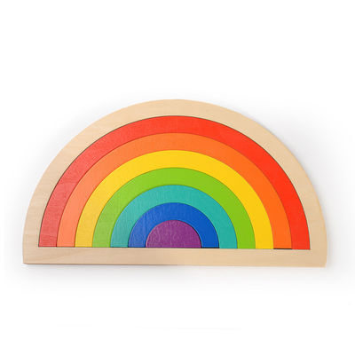 Blocs en bois de puzzle d'arc-en-ciel de développement de la petite enfance