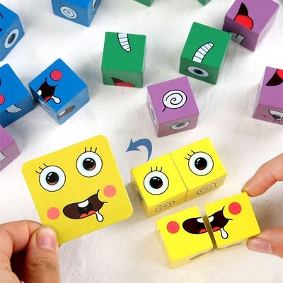 Le nouveau cube en changement de visage de puzzle d'expression de Montessori bloc constitutif l'enfant de jouets apprenant le jouet éducatif de match pour des enfants
