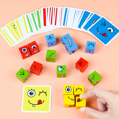 Le nouveau cube en changement de visage de puzzle d'expression de Montessori bloc constitutif l'enfant de jouets apprenant le jouet éducatif de match pour des enfants
