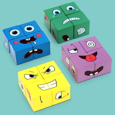 Le nouveau cube en changement de visage de puzzle d'expression de Montessori bloc constitutif l'enfant de jouets apprenant le jouet éducatif de match pour des enfants