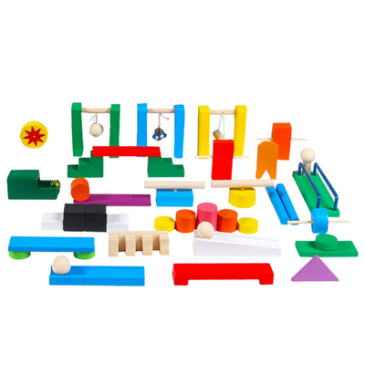 Accessoires colorés en bois de domino pour des enfants