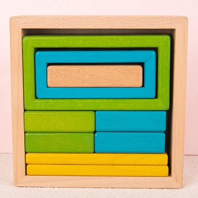 Le puzzle en bois d'emboîtement d'empileur bloque Montessori empilant le jeu pour l'école maternelle